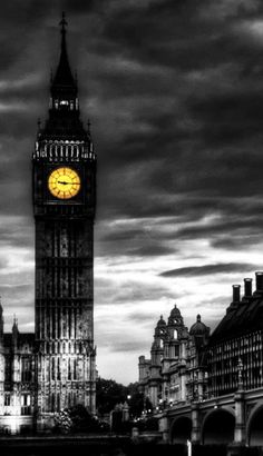 the big ben clock tower towering over the city of london, england at night time