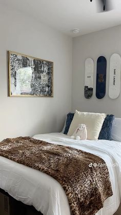 a bedroom with two skateboards mounted to the wall