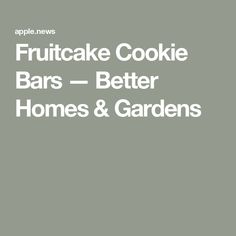 the words fruitcake cookie bars - better homes and gardens are in white letters on a gray background