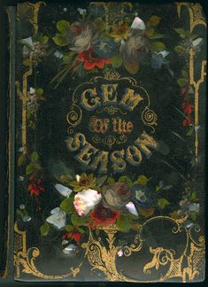 an old book with flowers and writing on the front cover that says gem of the season