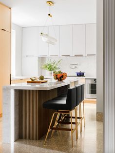 the kitchen is clean and ready to be used as a dining room or office space