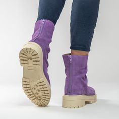 These lilac suede lug bottom boots were made for walking, everyday, everywhere, with just about everything in your closet. Luxurious Napa cream leather carefully crafted in Italy on rubber soles. They are sleek, they are sophisticated, and we can guarantee you will want to wear them every day. Step out daily in our Luxe Layla Cream Leather Short Slouch Boot. Lilac Boots, Lavender Ankle Boots, Purple Sole Boots, Purple Leather Lace-up Boots, Trendy Purple Ankle-high Boots, Silver Wedges, Pink Gem, Slouched Boots, Stepping Out