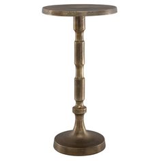 an old fashioned metal table with a wooden top and round base, on a white background