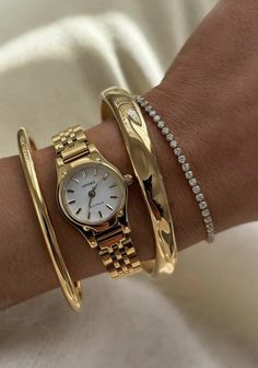 Bracelets Stack Aesthetic, Wrist Stack Jewelry, Gold Watch Bracelet Stack, Gold Jewelry Stack Wrist, Gold Bracelet Watch, Gold Watch Stack, Gold Bracelet Aesthetic Vintage