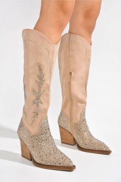 KNEE HIGH RHINESTONE WESTERN HEELED BOOT-Take your wardrobe to new heights with Anniston boots! Features a luxurious suede finish, sparkling rhinestone accents, and a sleek knee-high silhouette. These Western-inspired boots are the perfect choice for kicking off a fun-filled night-closed pointy toe-cowboy boots-zipper closure-lightly cushioned footbed-rubber outsole Style: WESTERN, BOOTS Embellishment: RHINESTONE Closure: ZIPPER Material Composition: Synthetic Leather Care Instructions: Hand Was Western High Heel Suede Boots, Western Suede High Heel Boots, Beige Suede Boots With Wide Calf, Western Suede Heeled Boots For Winter, Fitted Western Suede Knee-high Boots, Western Style Suede Heeled Boots For Winter, Western Style Suede Mid-calf Boots For Winter, Pointed Toe Suede Boots For Winter, Suede Snip Toe Heeled Boots For Fall