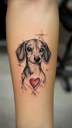 a dog with a heart tattoo on its leg