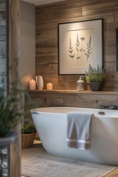 a white bath tub sitting next to a wooden wall