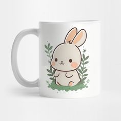 a white coffee mug with a cartoon bunny on it