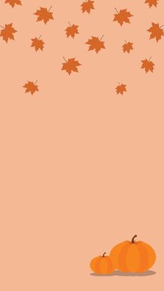 two pumpkins sitting on top of each other in front of an orange background with falling leaves