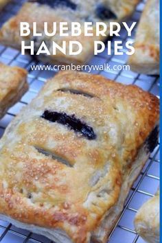 blueberry hand pies on a cooling rack with text overlay reading blueberry hand pies