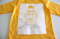 a child's t - shirt with a drawing of a cartoon character on it