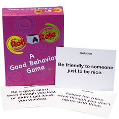 a card game with two cards in front of it and an envelope on the back