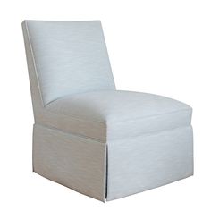 an upholstered white chair on a white background