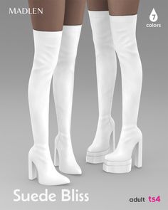 two women's white boots with high heeled shoes on the bottom and side