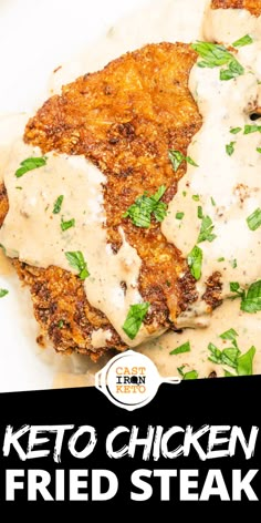 chicken fried steak with gravy and parsley on top, served in a white sauce