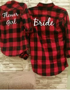 a red and black flannel shirt with the words flower girl on it