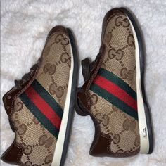 Gently Used 100% Authentic Kids Gucci Sneakers Designer Brown Sneakers With Rubber Sole, Sporty Brown Flat Sneakers, Brown Gucci Sneakers For Streetwear, Designer Brown Slip-on Sneakers, Brown Gucci Designer Sneakers, Designer Brown Gucci Sneakers, Casual Gucci Sneakers With Leather Sole, Designer Brown Sneakers With Round Toe, Designer Brown Round Toe Sneakers