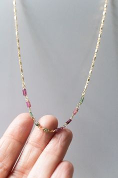 24k gold plated, tourmaline chain • CHAIN LENGTH: 16" + 2.5" extender chain • CLASP STYLE: Spring Due to the nature of the stones, each necklace is totally unique