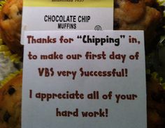 chocolate chip muffins are on display with a sign that says thanks for chipping in to make our first day of vbs very successful i appreciate all of your hard work