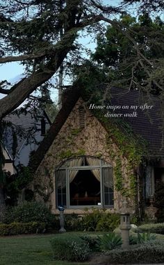 an old house with ivy growing on it's roof and the words home is where i am after dinner