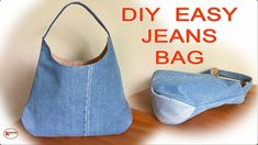 a denim purse with the words diy easy jeans bag next to it on a wooden table