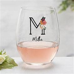 a wine glass with the letter m on it