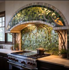 a stove top oven sitting inside of a kitchen under a stained glass window above it