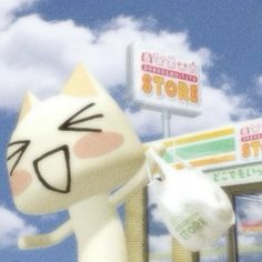 a white cat statue standing in front of a store with signs on it's side