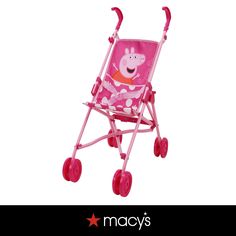 a pink toy stroller with pep the pig on it