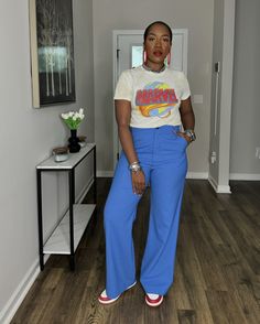 ~Recap of the OOTD~ Swipe to see the look styled with heels as well. Watch the previous reel for step by step details! 💚💙♥️ . 📌Exact graphic tee is linked in my stories and highlights under ‘graphic tees’. Shop exact and similar options on my @shop.ltk page linked in my bio. . ✨What I’m wearing: *Graphic tee: @junkfoodclothingco (gifted) *Pants: @zara *Clutch: @cortnieelizabeth *Earrings: @xoxo_bijou *Necklace: @imanijewelryco (gifted) *All bracelets: @amazonfashion *Sneakers: @jumpman23... Business Couture, Choir Uniforms, Job Interview Outfit, School Clothing, Date Night Outfit Ideas, Vacation Outfit Ideas, Night Outfit Ideas, Trouser Outfits, Hipster Style