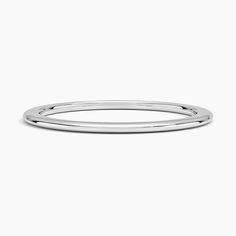 a thin silver ring on a white background