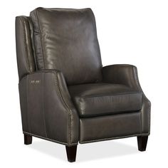 a gray leather recliner chair with nail polishing on the armrests and arms