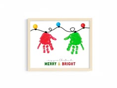 a christmas card with two handprints on it and the words merry and bright