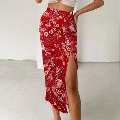 Step into elegance with our exquisite Floral Ruched Skirt, designed to make a statement. This stunning red skirt features a delicate floral pattern, perfect for adding a touch of sophistication to any wardrobe. Key Features: Premium Stretch Fabric: Made from high-quality, stretchy fabric, this skirt offers a comfortable fit and freedom of movement, perfect for any occasion. Floral Design: The charming floral pattern adds a feminine and timeless appeal, making it versatile for various occasions. Red Fitted Skirt For Summer, Fitted Red Skirt For Summer, Red Summer Beach Maxi Skirt, Red Maxi Skirt For Summer Beach, Red Maxi Skirt For Summer Beach Outing, High Waist Floral Maxi Skirt For Summer, Red Lined Beach Skirt, Red Lined Skirt For Beach, Red Beach Midi Skirt