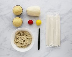 cupcakes and other ingredients on a marble surface