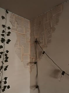 the wall is decorated with books and string lights