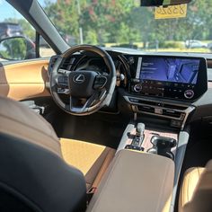 the interior of a car with an electronic display