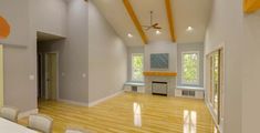 an empty living room with wood floors and white walls