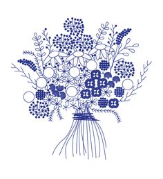 a blue vase filled with lots of flowers