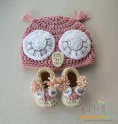 a crocheted owl hat and pair of baby shoes