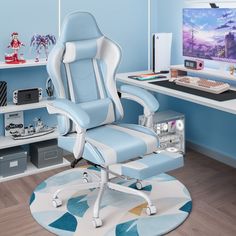 a blue and white office chair sitting in front of a computer desk