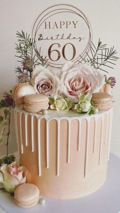 a birthday cake decorated with flowers and icing