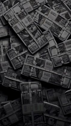 black and white photograph of many stacks of money