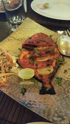 the meal is prepared and ready to be eaten on the table at the eatery