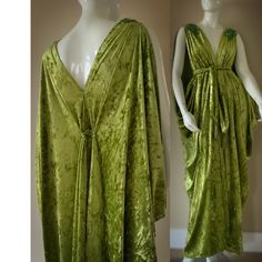 Handmade in our small exclusive studio in Portland Oregon. Indulge in the timeless elegance of our exquisite draped velvet Grecian gown, crafted from luxurious materials for a regal and goddess-like look.  The flowing design features intricate draping and a body-flattering silhouette, perfect for any formal occasion.  The soft rich crushed velvet in luscious chartreuse/olive green adds a touch of sophistication and luxury, while the Grecian-inspired details bring a touch of ancient glamour. Spectacular sparkling rhinestone appliqués on shoulders bring the bling for a one of a kind look!  This versatile gown can be worn in a number of different ways from a modest look to a more daring evening style. Pair with the matching turban, statement jewelry and heels for a look that's both dramatic a Grecian Dress Ancient, Ancient Grecian Fashion, Green Velvet Dress For Wedding, Luxury Velvet Wedding Dress, Fitted Velvet Dress With Traditional Drape, Fantasy Goddess Outfit, Empire Silhouette Dress, Greek Dress Goddesses, Greek Inspired Fashion