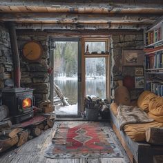 a living room filled with furniture and a fire place in front of a glass door