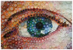 an eye made up of many different colored circles and bottles in the shape of buttons