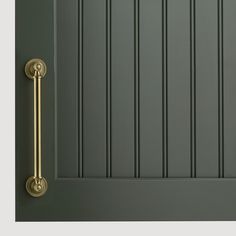 a green door with a gold handle on it