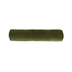 an olive green velvet roll on a white background with clippings to the side