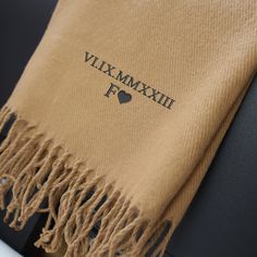 Embroidered Roman Numerals Scarf, Personalised Wedding Date & Initial Winter Scarves, Custom Comfy Woven Oversized Scarf, Anniversary Gifts Specifications: Our specialty lies in bringing your designs, logos, pictures, and imaginations to life on various apparel items in a visually appealing way. We take pride in delivering top-notch quality and value when it comes to customizing clothing and accessories. Take advantage of our limited-time offer of 70% off on our entire stock. Don't miss out on t Luxury Winter Shawl Scarf, Luxury Embroidered Shawl Scarf, Roman Numerals Dates, Scarf With Tassels, Luxury Red Shawl-style Scarf, Monogrammed Scarf, Winter Scarves, Christmas Gift For Him, Embroidered Scarf